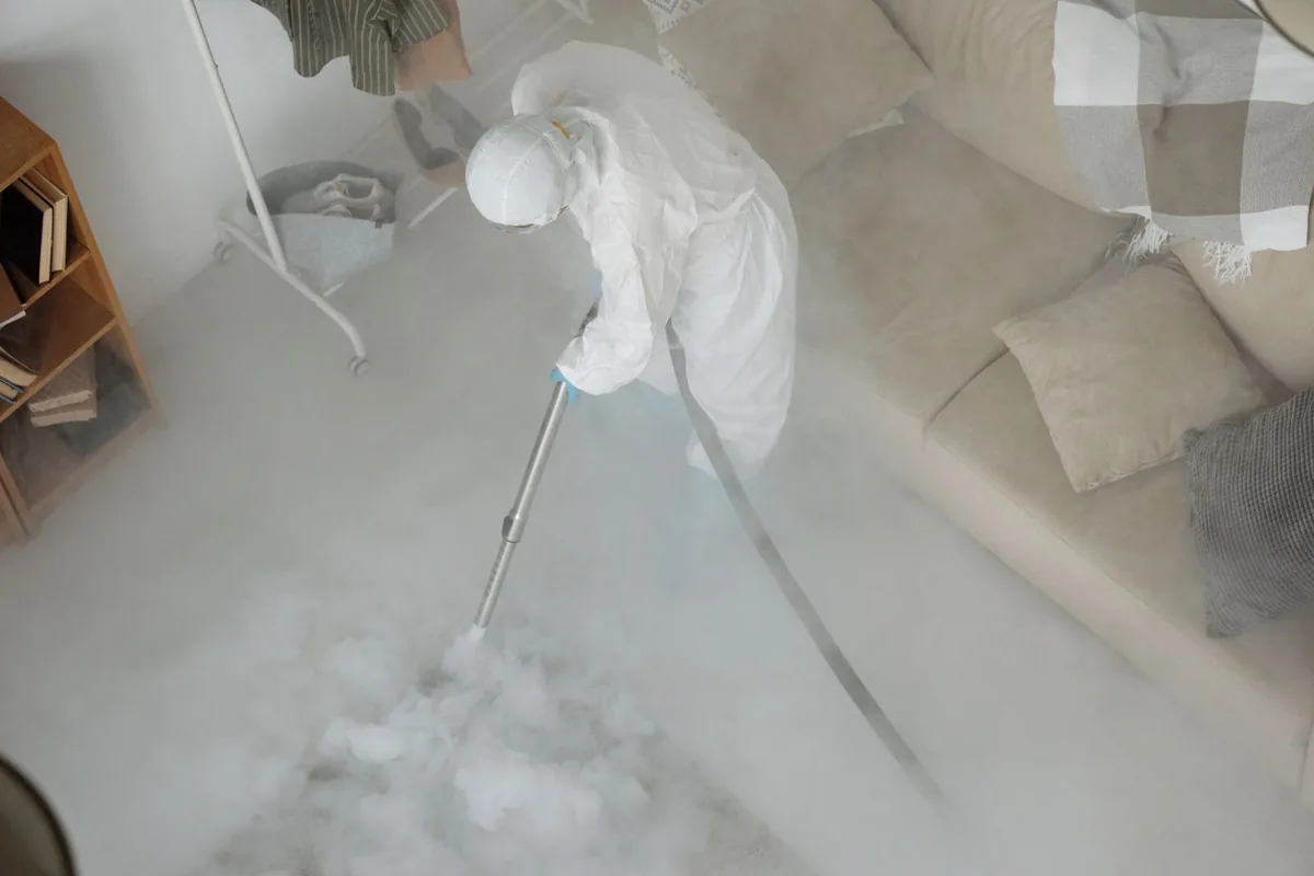 Biohazard cleanup technician in protective equipment, Lake Dot, Orlando, FL